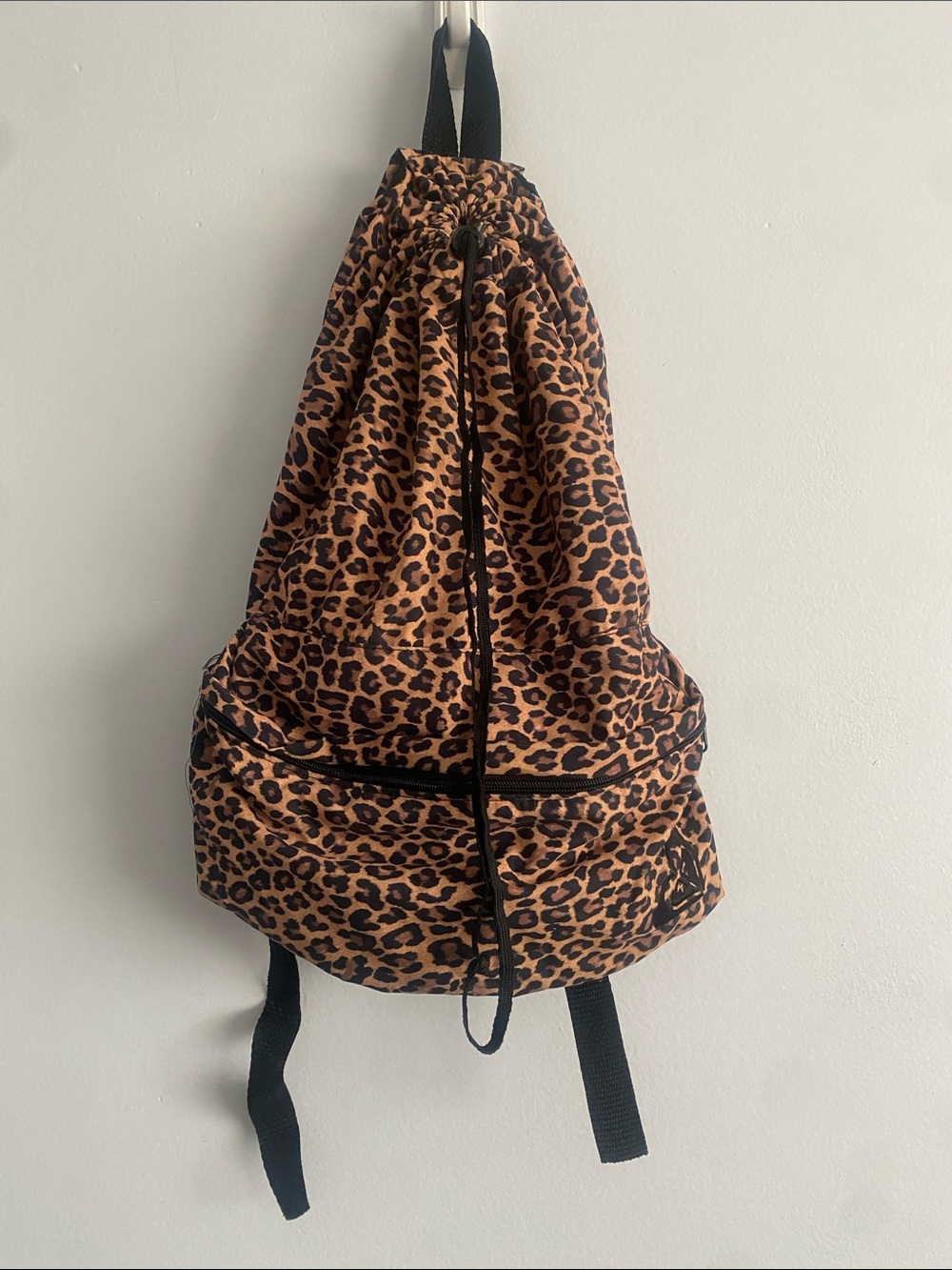 Roxy Leopard Print Drawstring Backpack in Brown and Black
